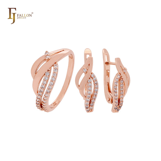 Conjunto de joias de ouro rosa com anéis e zircônias cúbicas brancas pavimentadas cruzando faixas de fita