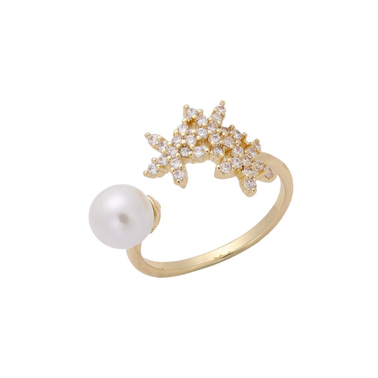 Ringe aus 14-kar?tigem Gold mit Sternen und Perlen