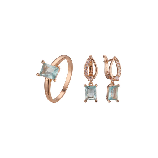 Solitario de oro rosa engastado con piedra azul lago grande talla esmeralda