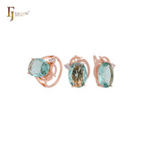 Riesiger ovaler großer Solitär mit weißen, orangefarbenen oder seeblauen Zirkonia. Luxuriöses Schmuckset aus Roségold mit Ringen