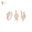 Kreis aus weißen Zirkoniasteinen und ineinandergreifenden Sternen, zweifarbiges Schmuckset aus Roségold mit Ringen