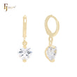 Pendientes Huggie de oro de 14 quilates con solitario de circonita cúbica blanca en forma de corazón