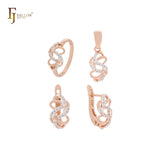 Conjunto de joyas de dos tonos en oro rosa entrelazado con cintas giratorias, anillos y colgante
