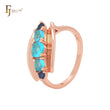Anillos de moda en oro rosa con concha abierta que incluyen cinco circonitas azules mixtas