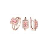 Conjunto de joias em ouro rosa com pedras esmeralda lapidadas com halo branco cz