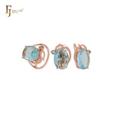 Riesiger ovaler großer Solitär mit weißen, orangefarbenen oder seeblauen Zirkonia. Luxuriöses Schmuckset aus Roségold mit Ringen