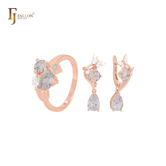 Conjunto de joyas de oro rosa con mariposa y circonitas azul lago y anillos
