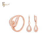 Conjunto de joyas geométricas de oro rosa con circonitas blancas en forma de lágrima y anillos