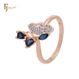 Cluster weißer CZs Schmetterling mit tiefblauen CZs Rose Gold zweifarbige Moderinge