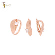 Conjunto de joyas de oro rosa con anillos y circonitas blancas curvadas con cinta gruesa