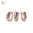 Conjunto de joias de dois tons com anéis e três zircônias azuis e brancas em ouro rosa