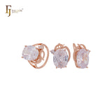 Riesiger ovaler großer Solitär mit weißen, orangefarbenen oder seeblauen Zirkonia. Luxuriöses Schmuckset aus Roségold mit Ringen