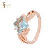 Anillos de moda en oro rosa con corte Asscher y lazo azul lago