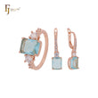 Schmuckset aus Roségold mit Ringen und weißen und seeblauen Zirkonia im Smaragdschliff