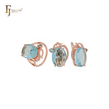 Riesiger ovaler großer Solitär mit weißen, orangefarbenen oder seeblauen Zirkonia. Luxuriöses Schmuckset aus Roségold mit Ringen