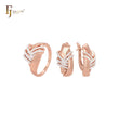 Luxuriöses Schmuckset aus Roségold mit mehreren ineinandergreifenden Bändern und Ringen