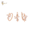 Conjunto de joyas de oro rosa con circonitas blancas y mariposas y anillos