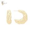 Pendientes de aro con forma de baguette retorcida en forma de C en oro de 14 quilates, oro rosa y oro blanco.