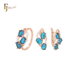 Conjunto de joias em dois tons com três zircônias cúbicas azuis-oceano e anéis em ouro rosa