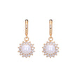 Aretes de perlas con halo de oro rosa