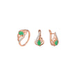 Rose Gold two tone solitaire emerald stone in a flame set