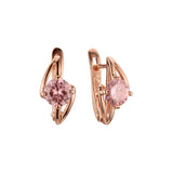 Pendientes solitarios de oro rosa con circonitas cúbicas de colores y símbolo de rayo